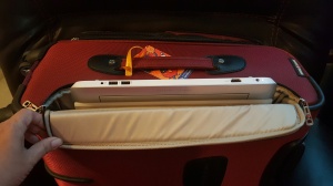 My HP 2-in-1 easily fits inside the laptop pocket.